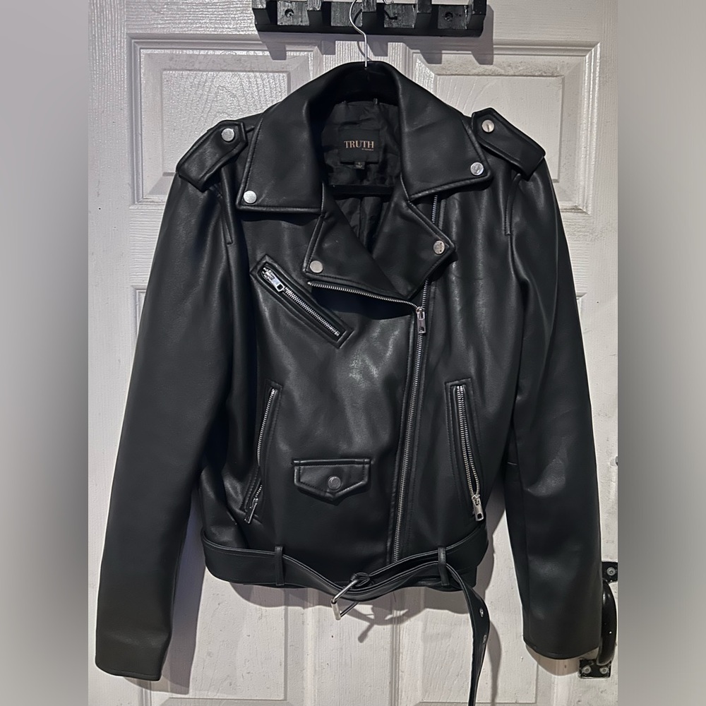Black leather biker style jacket.